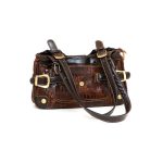 small lady's leather brown bag